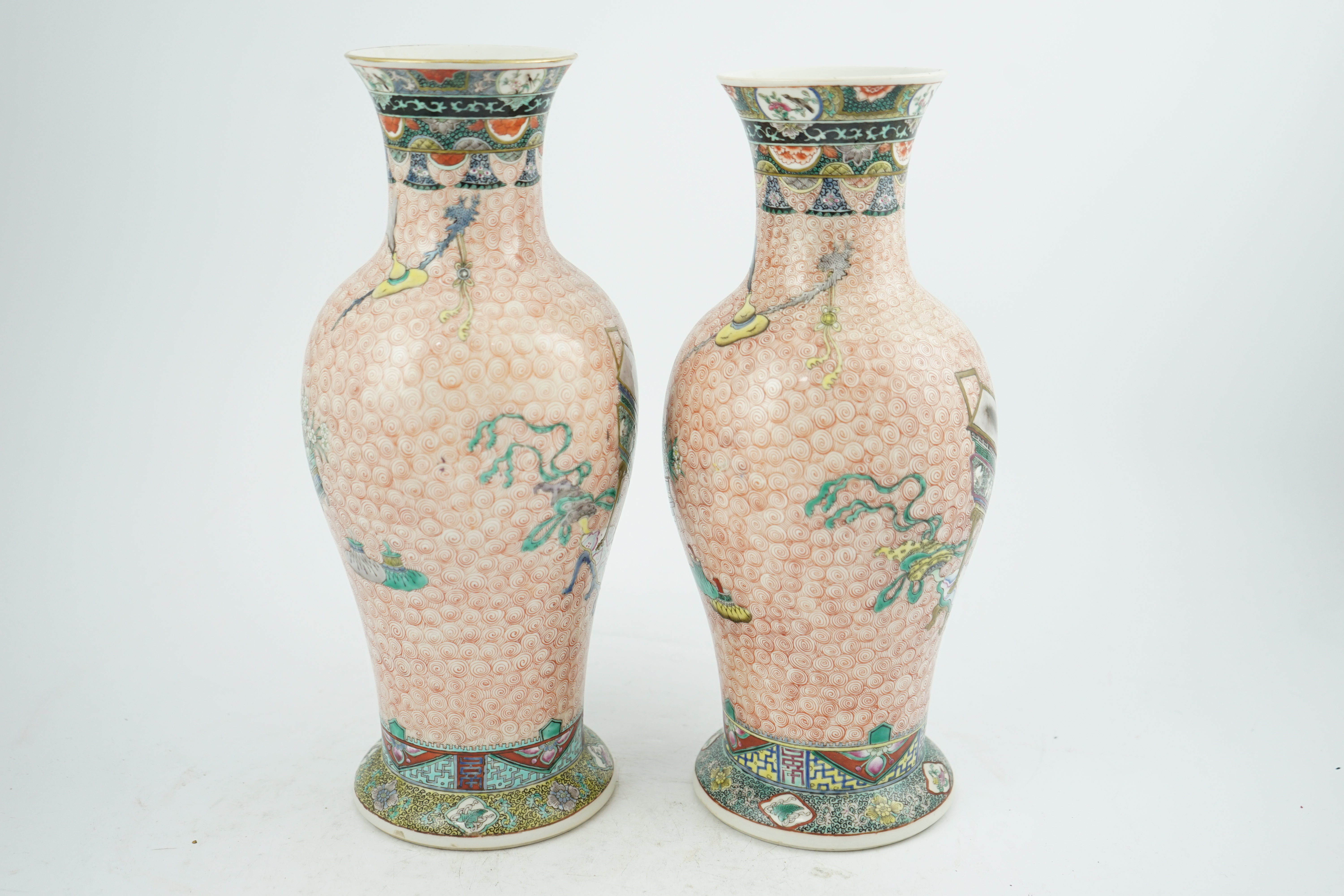 A near pair of Chinese famille rose ‘Hundred Antiques’ baluster vases, Kangxi mark, early 20th century